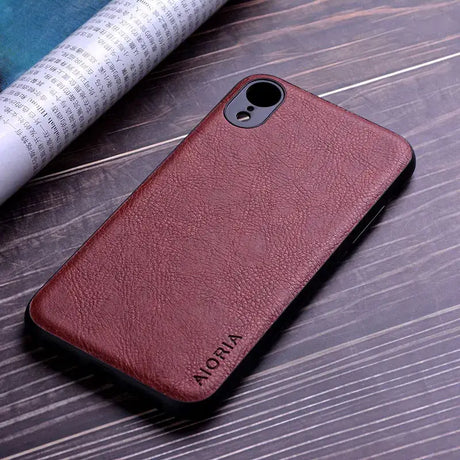 The back of a brown leather iphone case