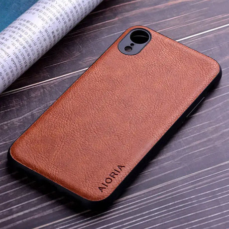 The back of a brown leather iphone case