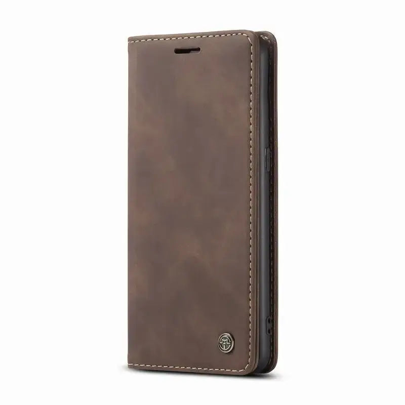 the back of a brown leather iphone case