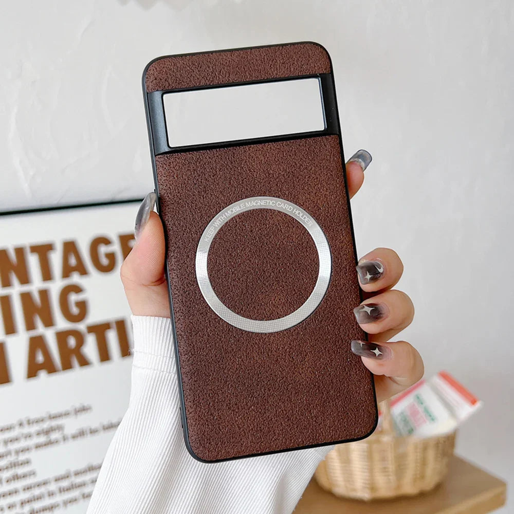 Brown leather phone case with a circular design and a rectangular window.