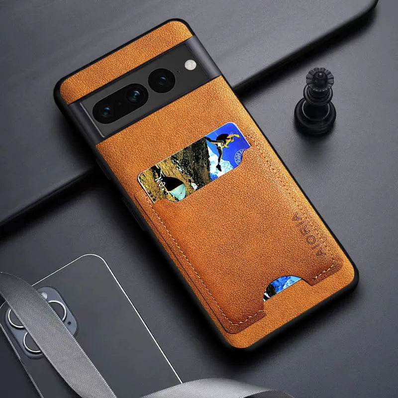 Brown leather phone case with card slots.