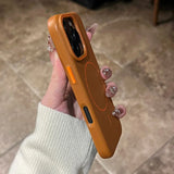 Brown leather-textured phone case.