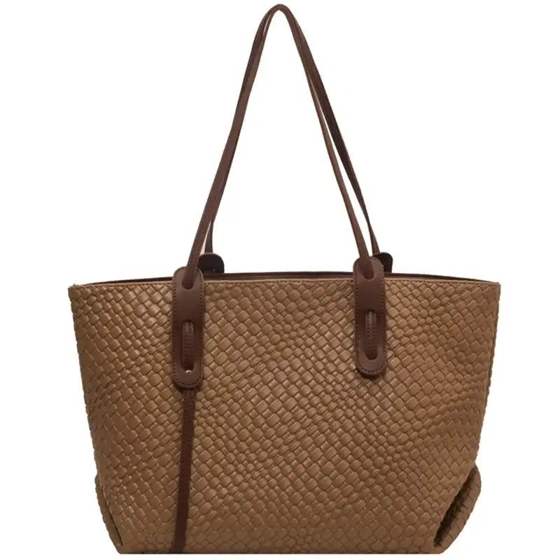 a brown leather tote bag