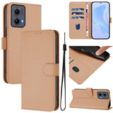A brown leather wallet-style phone case with card slots and a wrist strap.