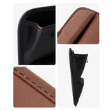 the leather wallet case is shown with the zipper open