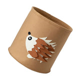 a brown paper cup with a dog face on it
