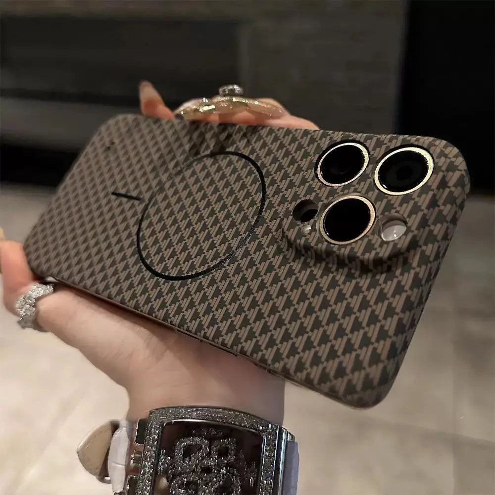 Brown patterned smartphone case with triple camera cutouts and a circular magnetic accessory.
