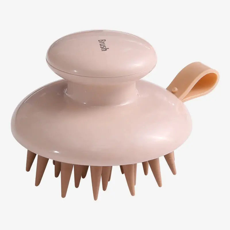 a pink hair brush with a wooden handle