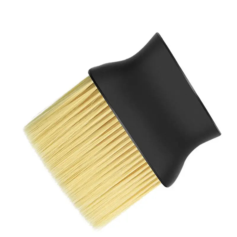 a brush with a black handle