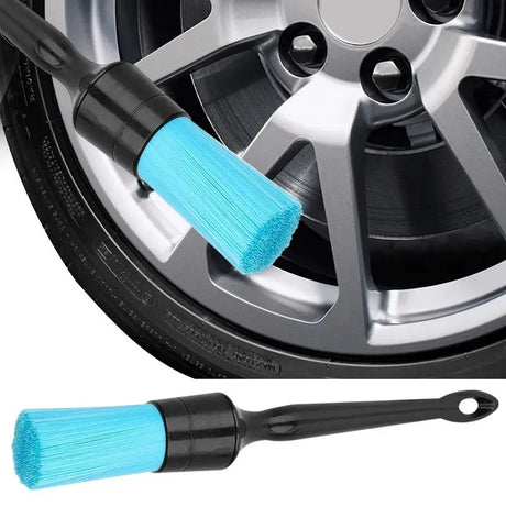 a wheel with a brush and a tire