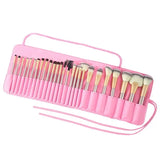 a pink makeup brush case with a pink handle