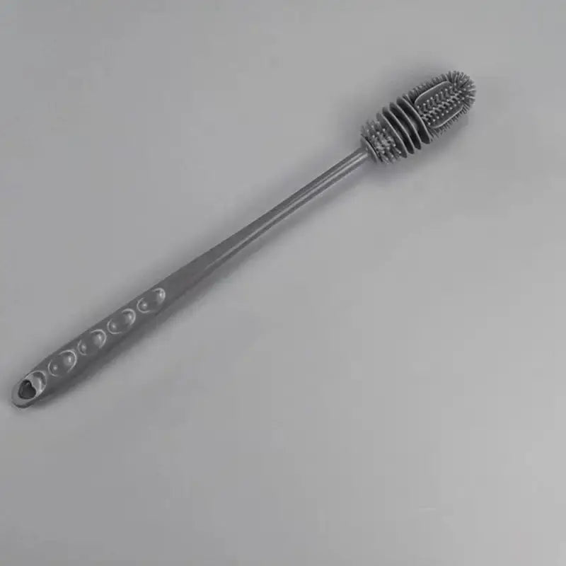 a metal brush with a metal handle