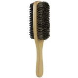 a wooden brush with a black bristles on it