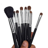 the 7 piece brush set is shown in a hand