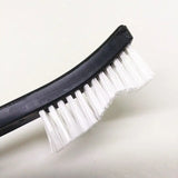 a brush with a white bristles on it
