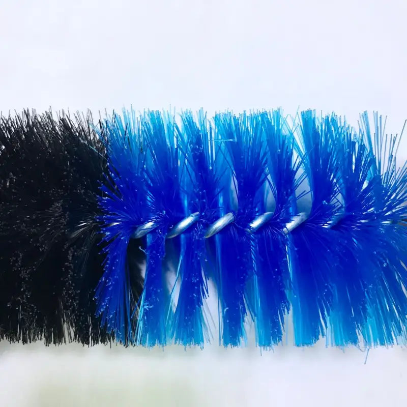 two brushes with blue and black brushes