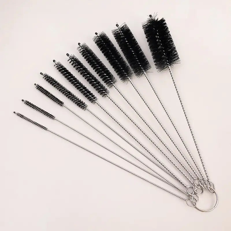 a set of brushes and brushes on a white background