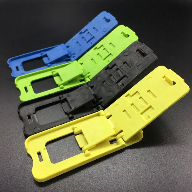 a set of four plastic clips