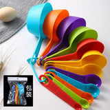 a bunch of colorful plastic measuring spoons