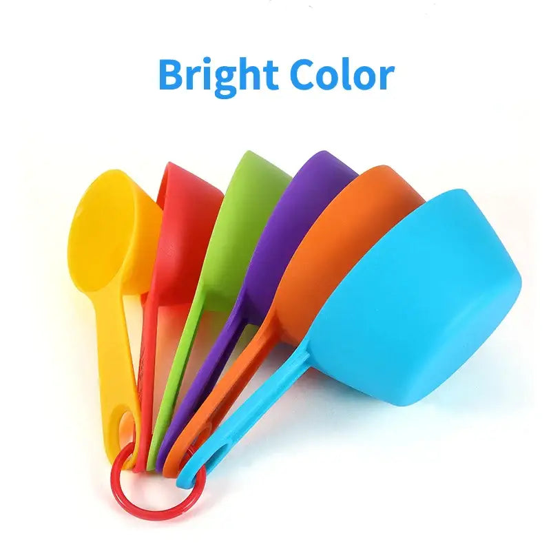 a bunch of colorful plastic spoons with the words bright color