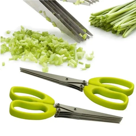 A bunch of green onions and a pair of scissors