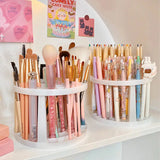 a white shelf with makeup brushes and brushes