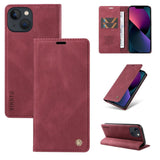 Burgundy leather wallet phone case for an iPhone.