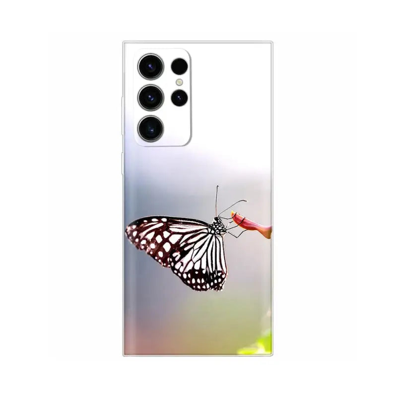 a butterfly on a flower phone case