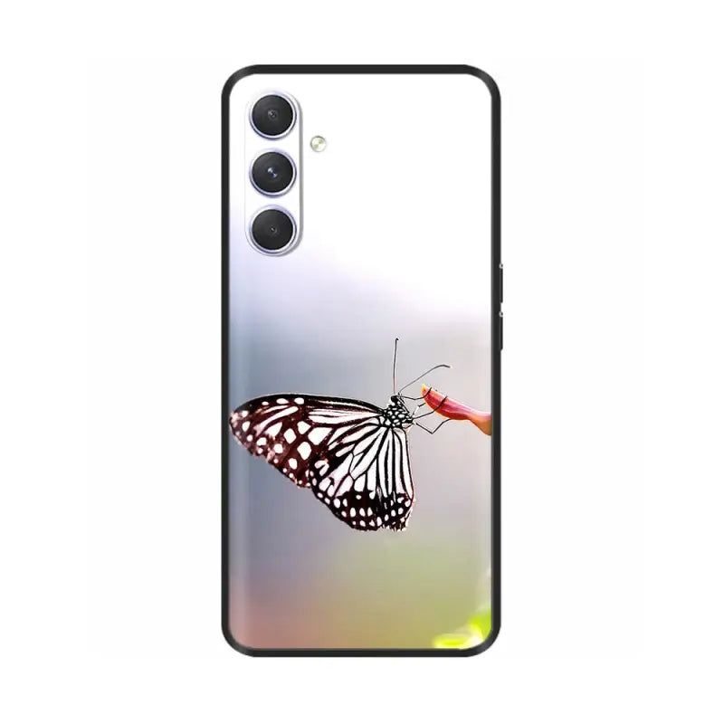 a butterfly on a flower phone case