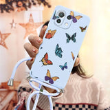 a woman holding a phone case with butterflies on it