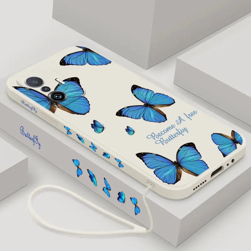 a phone case with blue butterflies on it