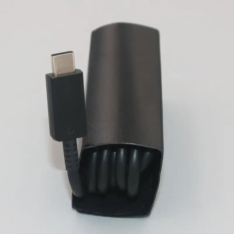 a black usb cable with a white background