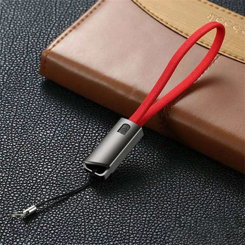 a red cable with a black cord