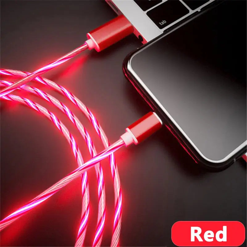 a red cable connected to a laptop