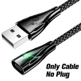 a usb cable with a green light on it