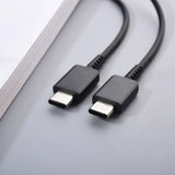there are two usb cables connected to a laptop computer
