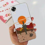 a person holding a phone case with a desert scene