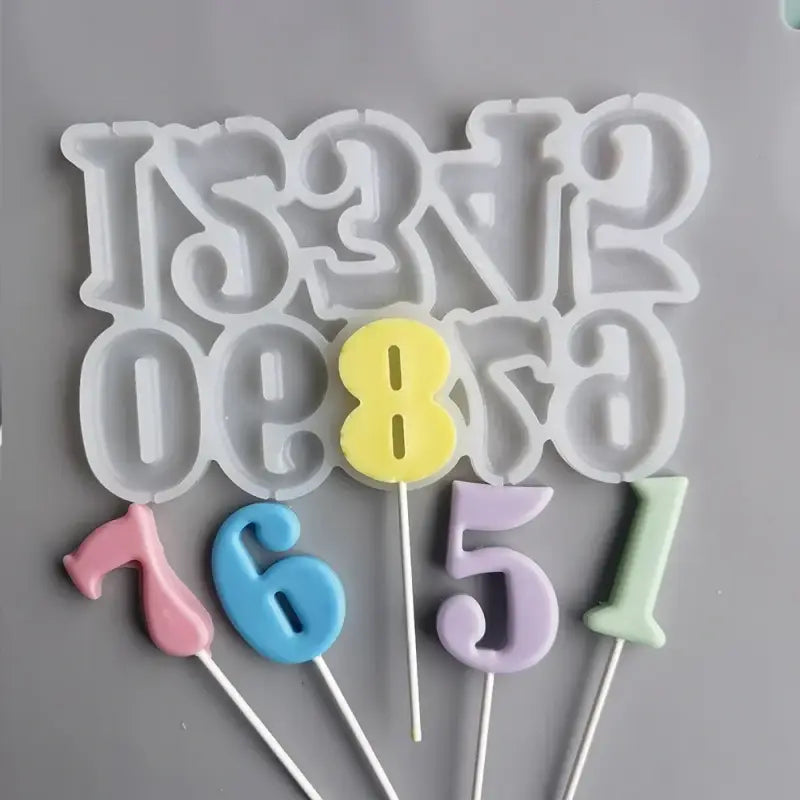 a cake topper with the letters and numbers