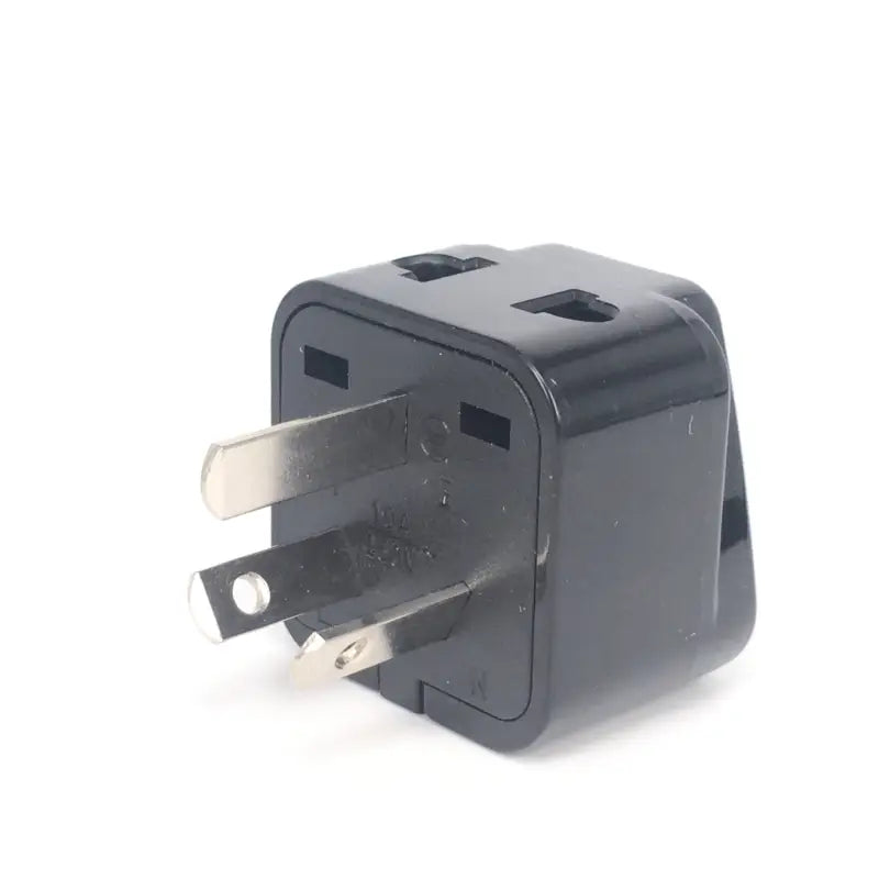 a black plug with a white background