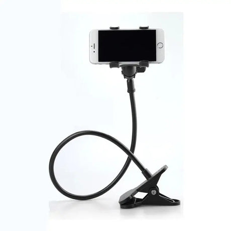 a close up of a cell phone on a stand with a cord