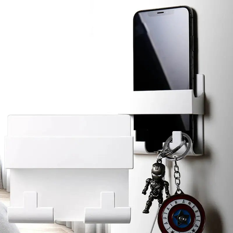a white phone holder with a black phone