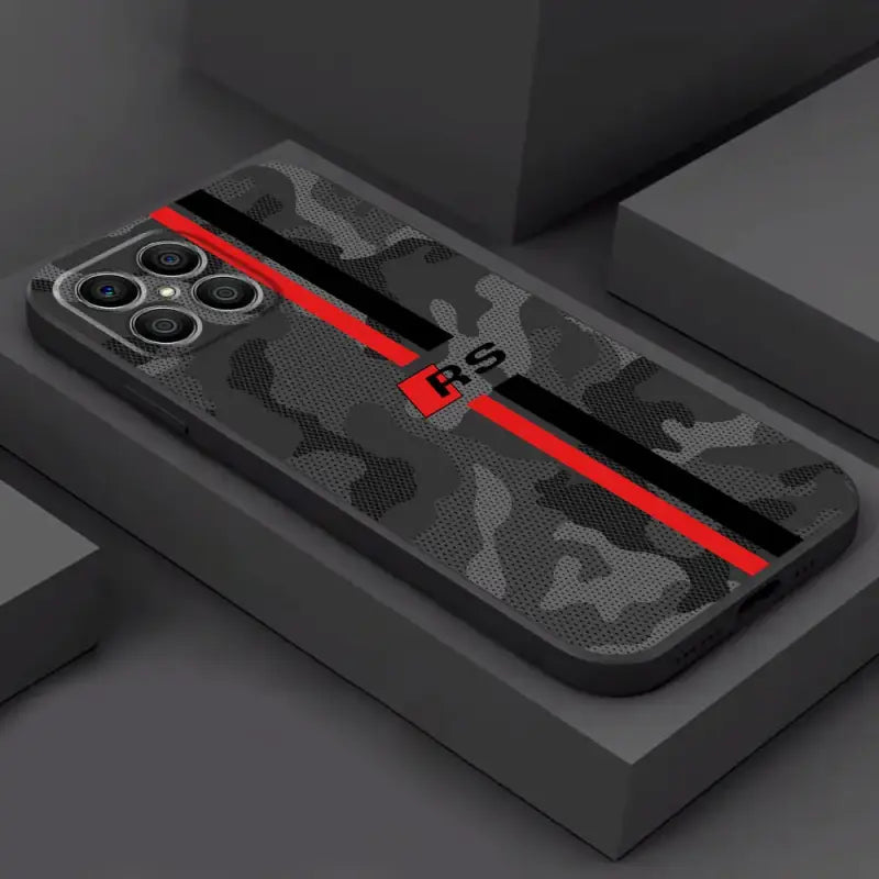 The camouflage iphone case is shown on a black surface