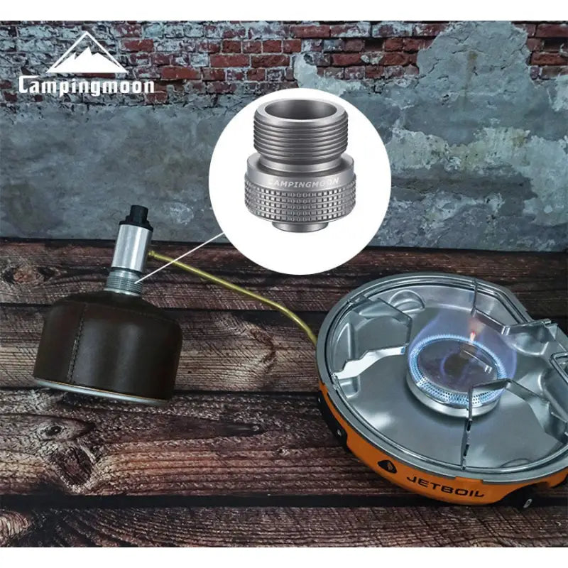 the camping stove with a gas cap and a gas cap