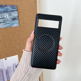 Carbon fiber-textured phone case with a circular wireless charging area and a window for the screen.