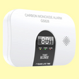 Carbon monoxide alarm with a digital display showing ’80’’ and a test/silence button.