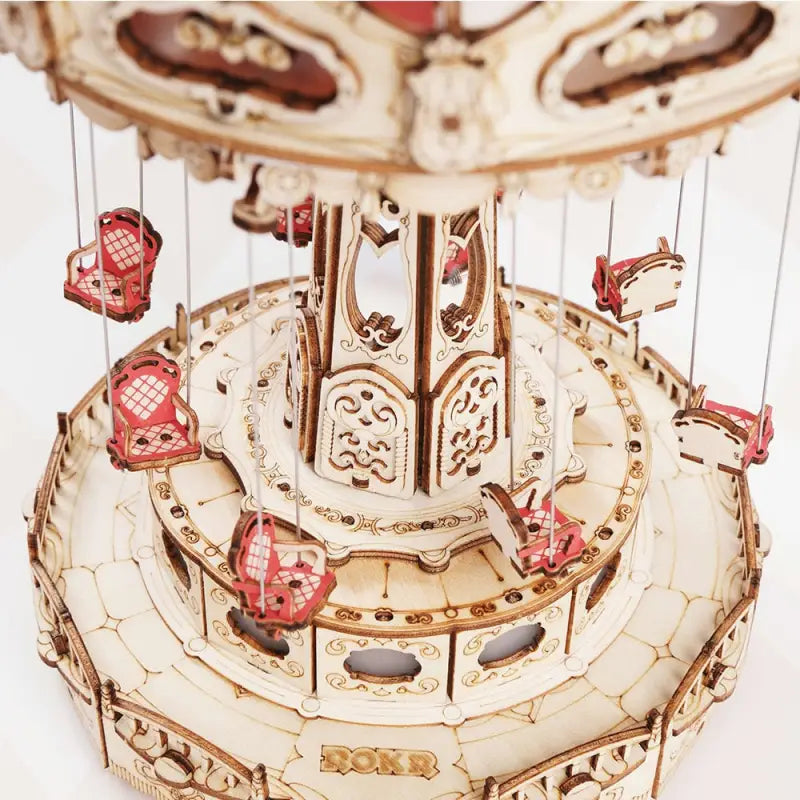 a carousel with a red and white carousel