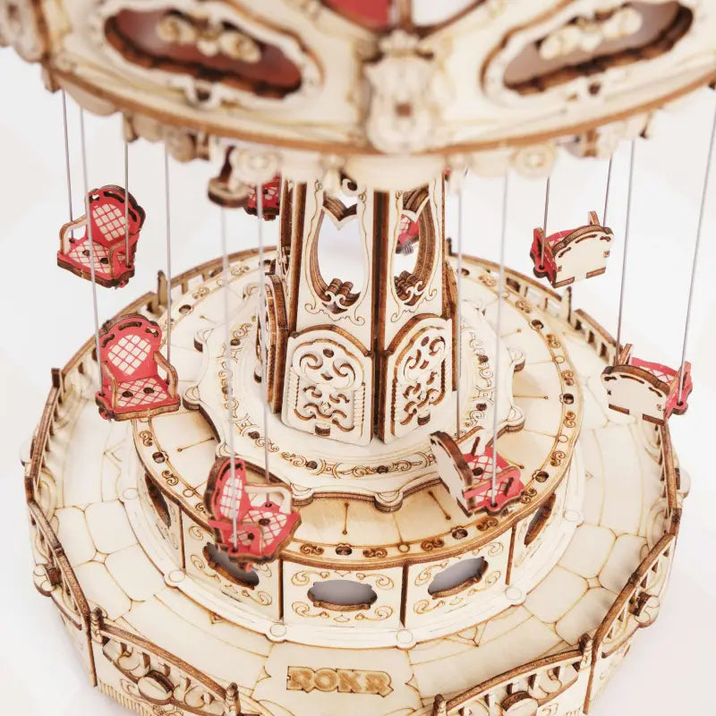 a carousel with a red and white carousel