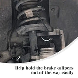 a close up of a car’s front suspension with a text over it
