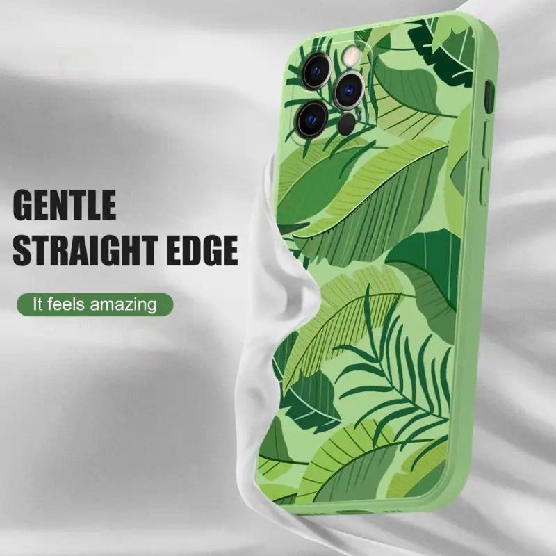 the case is designed to look like a tropical leaf