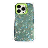 the back of a green iphone case with a green and blue pattern